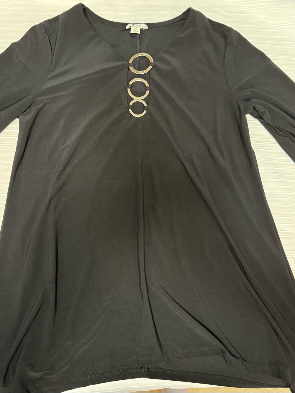 Black Long-Sleeve Blouse with Decorative Ring Detail